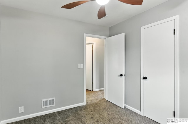 3080 S 48th St, Omaha, NE 68106 - unfurnished bedroom featuring carpet floors and ceiling fan