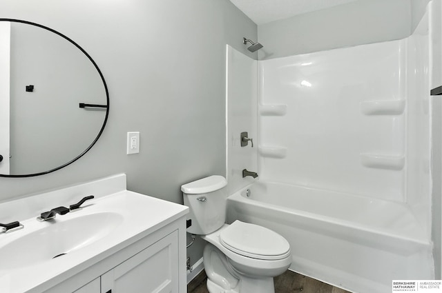 3080 S 48th St, Omaha, NE 68106 - bathroom featuring vanity, wood finished floors, and bathtub / shower combination