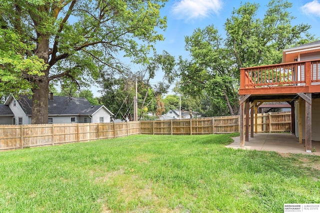 3080 S 48th St, Omaha, NE 68106 - fenced backyard with a patio and a wooden deck