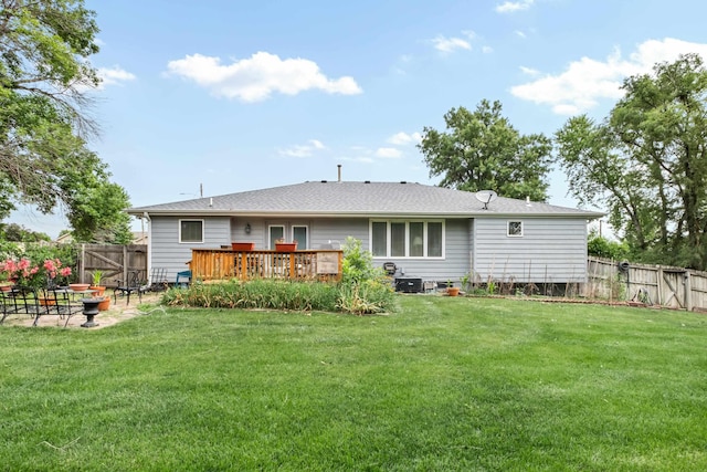 411 Hillside Ave, Yutan, NE 68073 - rear view of property featuring a fenced backyard, a wooden deck, and a fire pit