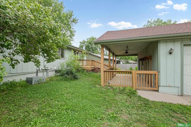 36 Redwood Ln, Yutan, NE 68073 - view of grassy yard featuring a ceiling fan and a deck
