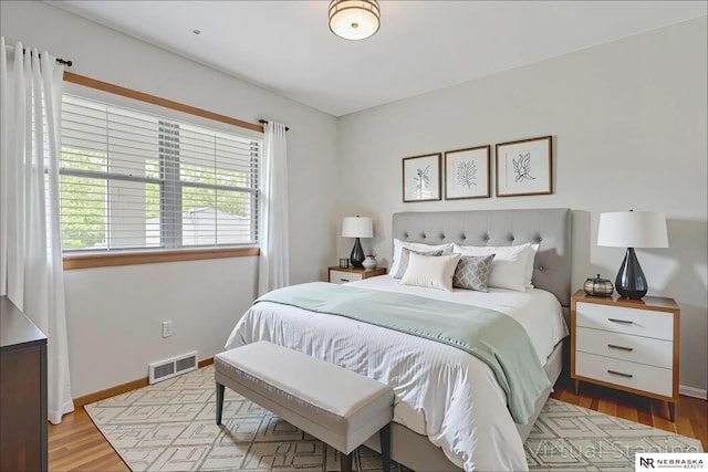 11018 Hascall St, Omaha, NE 68144 - bedroom featuring light wood finished floors and baseboards