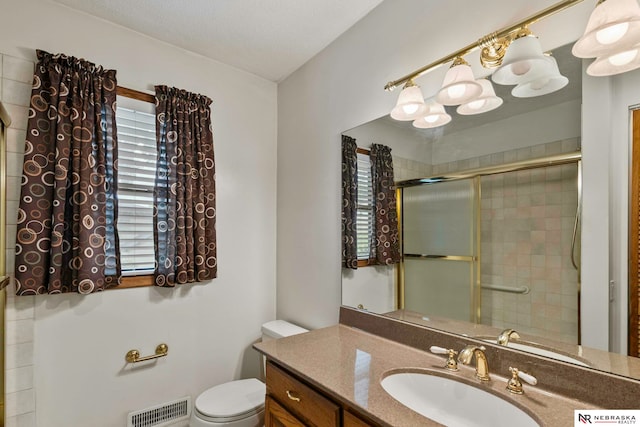 11018 Hascall St, Omaha, NE 68144 - bathroom featuring vanity and a tile shower