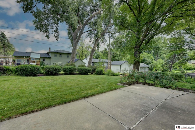 11018 Hascall St, Omaha, NE 68144 - view of green lawn with a patio