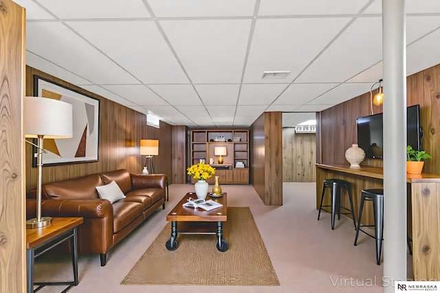 11018 Hascall St, Omaha, NE 68144 - common area featuring wood walls and a paneled ceiling