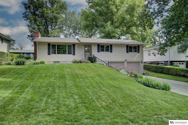 11018 Hascall St, Omaha, NE 68144 - single story home featuring a chimney, a garage, a front lawn, and concrete driveway