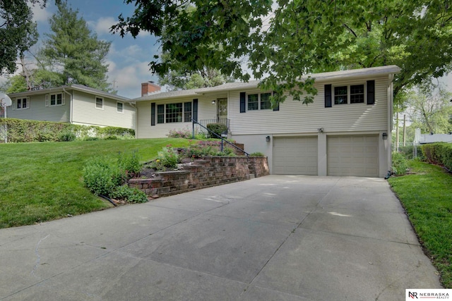 11018 Hascall St, Omaha, NE 68144 - ranch-style home with an attached garage, concrete driveway, a front lawn, and a chimney