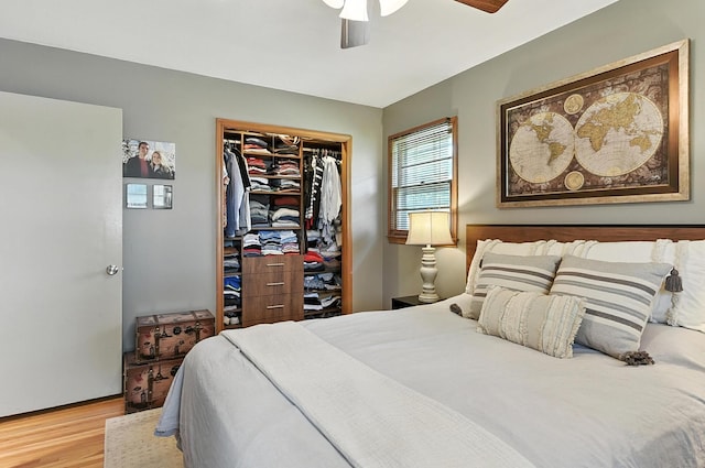 9903 Pasadena Ave, Omaha, NE 68124 - bedroom featuring wood finished floors, a closet, and a ceiling fan