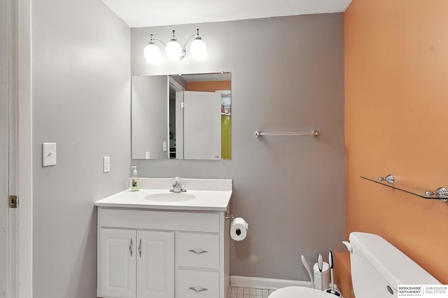 9903 Pasadena Ave, Omaha, NE 68124 - half bathroom featuring toilet and vanity