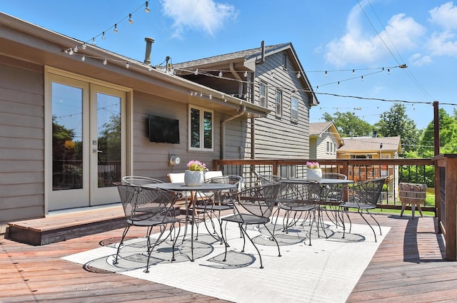 9903 Pasadena Ave, Omaha, NE 68124 - wooden terrace featuring french doors and outdoor dining area