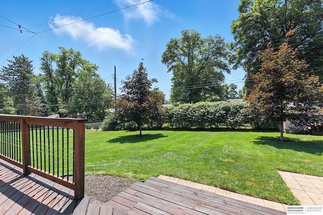 9903 Pasadena Ave, Omaha, NE 68124 - view of green lawn with a wooden deck