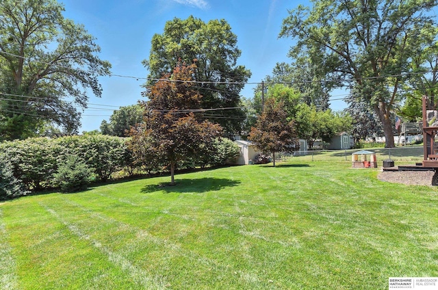 9903 Pasadena Ave, Omaha, NE 68124 - view of yard featuring a storage unit