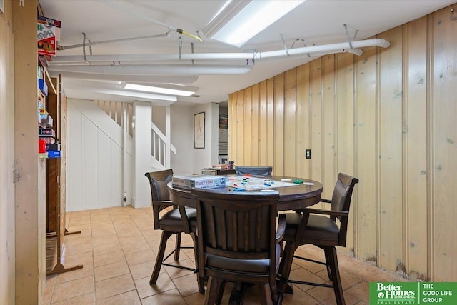 4307 Prescott Ave, Lincoln, NE 68506 - dining space with stairway and wood walls