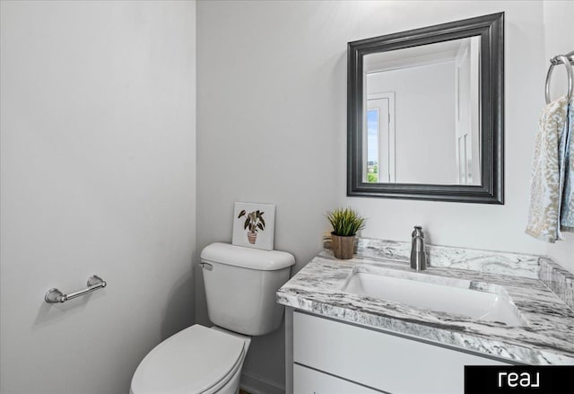 7409 N 176th Ave, Bennington, NE 68007 - bathroom featuring vanity and toilet