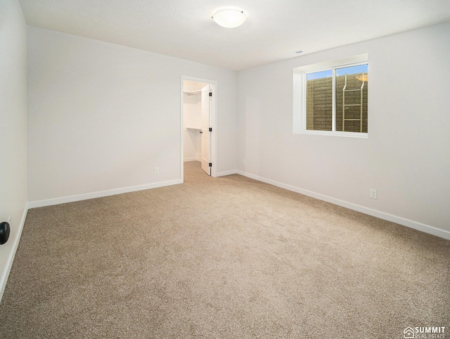 1070 Titan Dr, Hickman, NE 68372 - empty room featuring carpet and baseboards