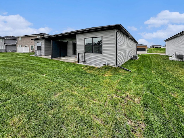 1070 Titan Dr, Hickman, NE 68372 - rear view of property with a yard and a patio area