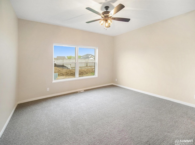 1120 Titan Dr, Hickman, NE 68372 - unfurnished room featuring carpet flooring and a ceiling fan