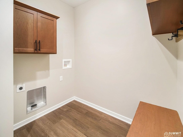 1120 Titan Dr, Hickman, NE 68372 - laundry room with hookup for an electric dryer, dark wood-type flooring, cabinet space, and hookup for a washing machine