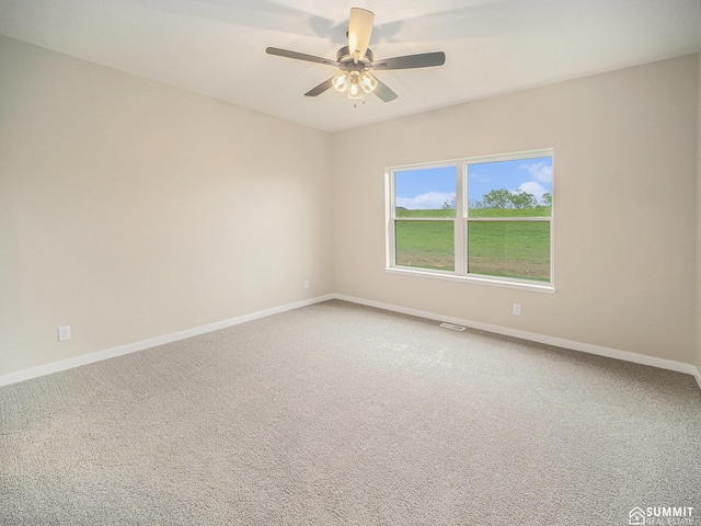 1130 Titan Dr, Hickman, NE 68372 - unfurnished room with light carpet and ceiling fan