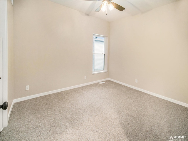 1130 Titan Dr, Hickman, NE 68372 - unfurnished room featuring carpet floors, ceiling fan, and vaulted ceiling