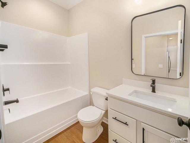 1130 Titan Dr, Hickman, NE 68372 - full bath featuring wood finished floors, vanity, and bathing tub / shower combination