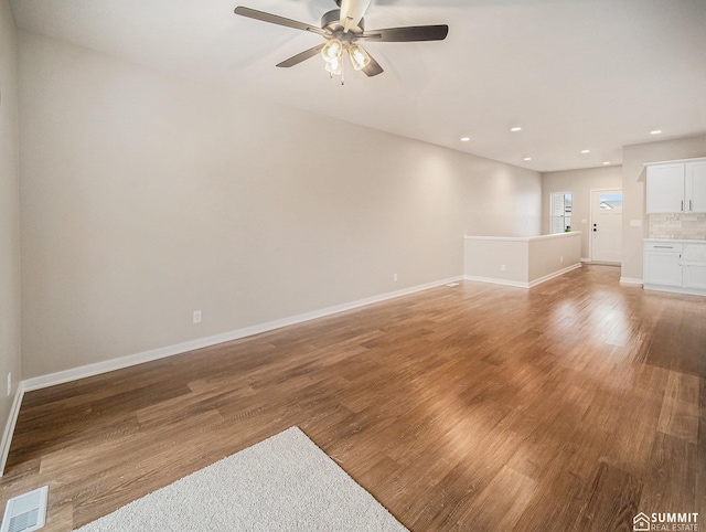 1130 Titan Dr, Hickman, NE 68372 - unfurnished living room with ceiling fan, light wood-style flooring, and recessed lighting