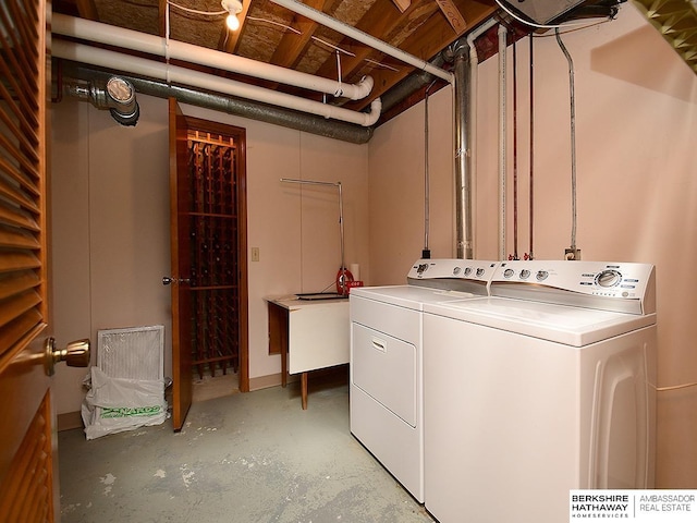1502 Sunshine Blvd, Bellevue, NE 68123 - washroom featuring washing machine and clothes dryer