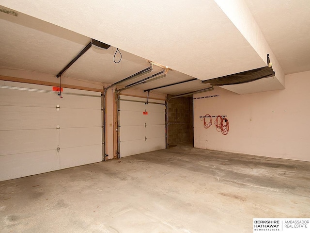 1502 Sunshine Blvd, Bellevue, NE 68123 - garage with a garage door opener