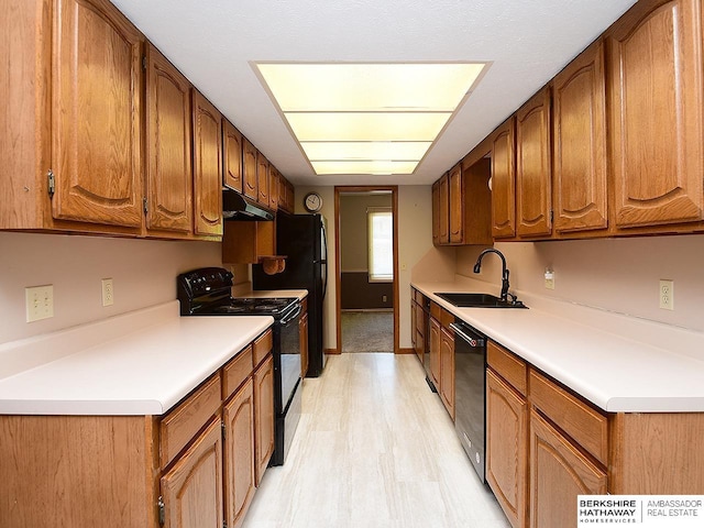 1502 Sunshine Blvd, Bellevue, NE 68123 - kitchen featuring black range with electric cooktop, under cabinet range hood, dishwasher, light wood finished floors, and brown cabinetry