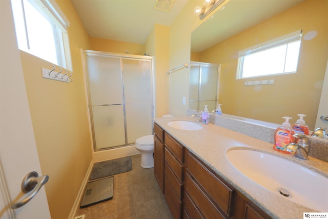 6005 S 191st Ter, Omaha, NE 68135 - bathroom with a shower stall and double vanity