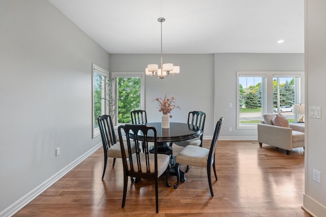 1320 S 190th Plz, Omaha, NE 68130 - dining space with a chandelier, plenty of natural light, wood finished floors, and recessed lighting