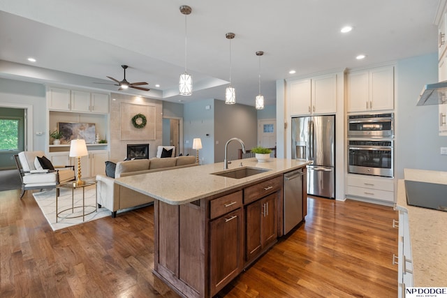 1320 S 190th Plz, Omaha, NE 68130 - kitchen featuring stainless steel appliances, dark wood-type flooring, recessed lighting, and white cabinetry