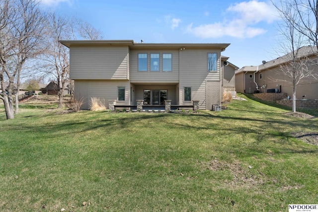 1320 S 190th Plz, Omaha, NE 68130 - back of house with a lawn