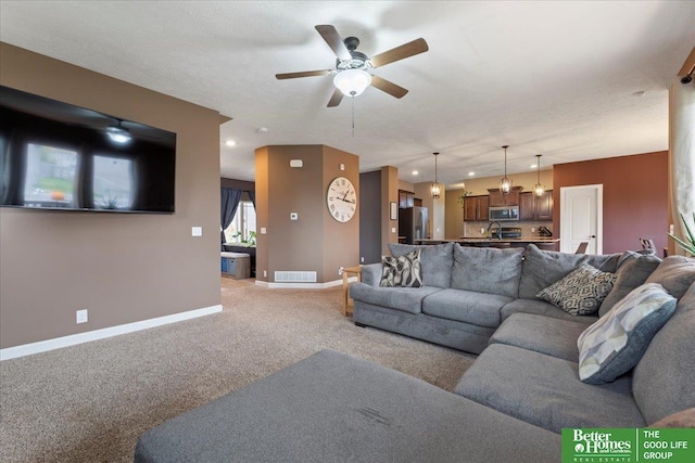 14611 S 24th St, Bellevue, NE 68123 - carpeted living room with ceiling fan and recessed lighting