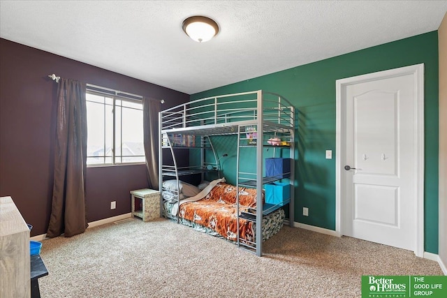 14611 S 24th St, Bellevue, NE 68123 - carpeted bedroom featuring baseboards and a textured ceiling
