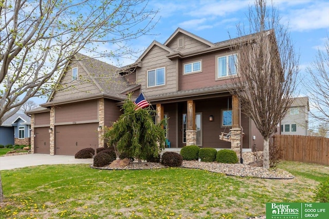 14611 S 24th St, Bellevue, NE 68123 - craftsman-style house with concrete driveway, stone siding, and covered porch