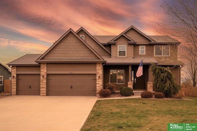 14611 S 24th St, Bellevue, NE 68123 - view of front of property featuring a garage, concrete driveway, and a yard