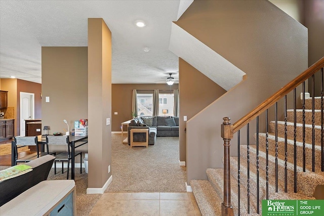 14611 S 24th St, Bellevue, NE 68123 - staircase featuring carpet, a ceiling fan, tile patterned floors, and recessed lighting