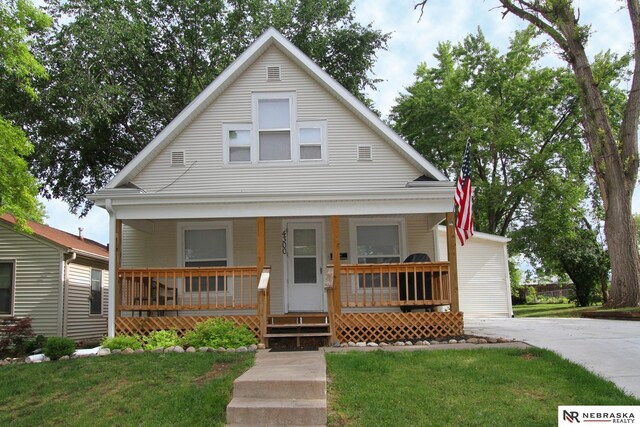 4300 N St, Lincoln, NE 68510 - bungalow with a porch and a front lawn