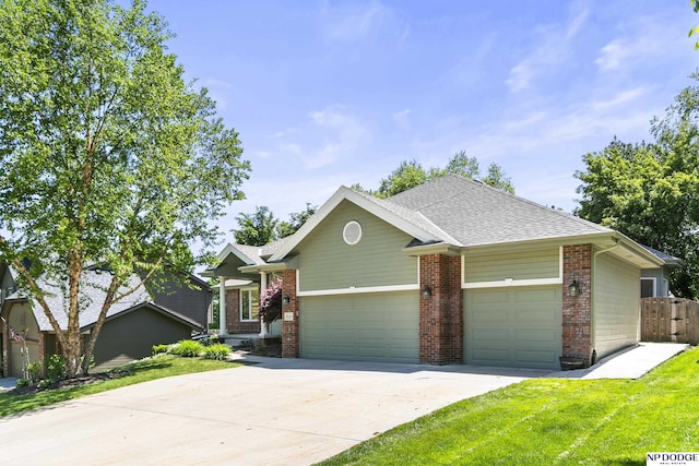 16367 Y St, Omaha, NE 68135 - craftsman house with an attached garage, brick siding, driveway, and roof with shingles