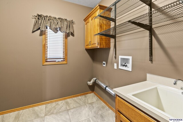 16367 Y St, Omaha, NE 68135 - washroom featuring cabinet space, electric dryer hookup, and washer hookup