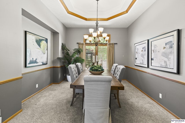 16367 Y St, Omaha, NE 68135 - carpeted dining room featuring a chandelier, ornamental molding, and a tray ceiling