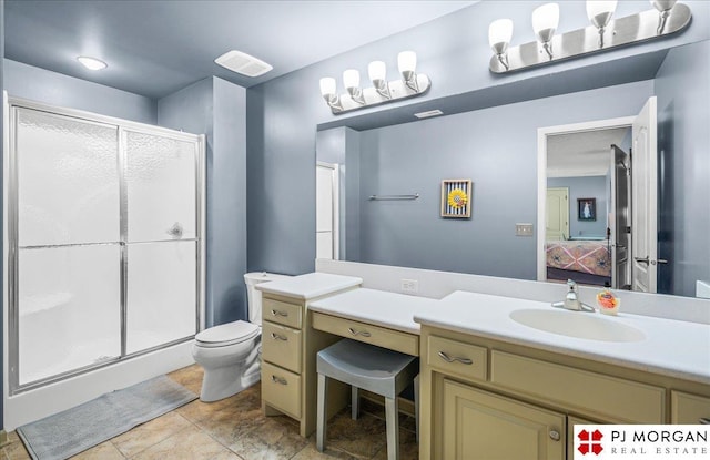 733 N 157th Cir, Omaha, NE 68118 - full bath with a stall shower, ensuite bathroom, vanity, and tile patterned floors