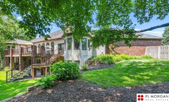 733 N 157th Cir, Omaha, NE 68118 - rear view of property with stairs and a deck