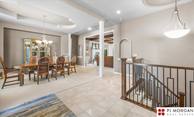 733 N 157th Cir, Omaha, NE 68118 - dining room with a chandelier, light tile patterned flooring, and recessed lighting