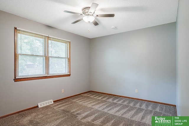 1800 N Clarmar Ave, Fremont, NE 68025 - carpeted spare room featuring baseboards and a ceiling fan
