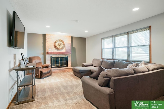 1800 N Clarmar Ave, Fremont, NE 68025 - living area with light carpet, a brick fireplace, and recessed lighting