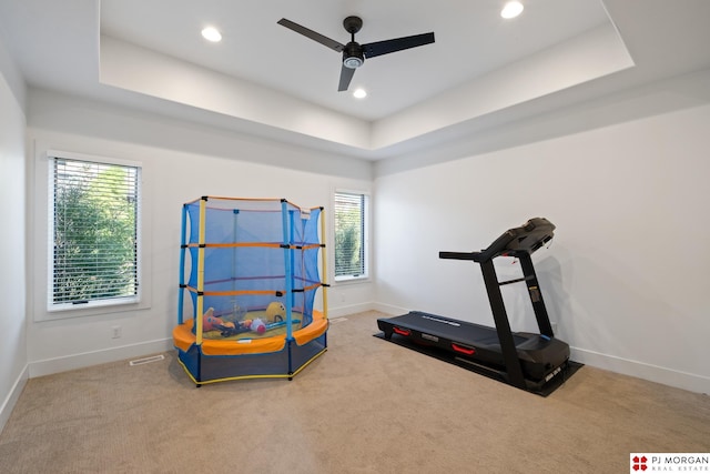 21034 X St, Omaha, NE 68022 - workout area featuring carpet, a tray ceiling, ceiling fan, and recessed lighting