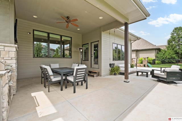 21034 X St, Omaha, NE 68022 - view of patio featuring a ceiling fan, outdoor dining area, and an outdoor living space