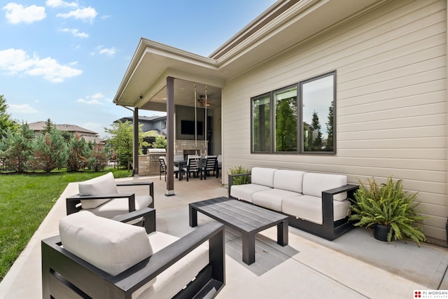 21034 X St, Omaha, NE 68022 - view of patio / terrace featuring an outdoor living space, outdoor dining area, a ceiling fan, and an outdoor kitchen